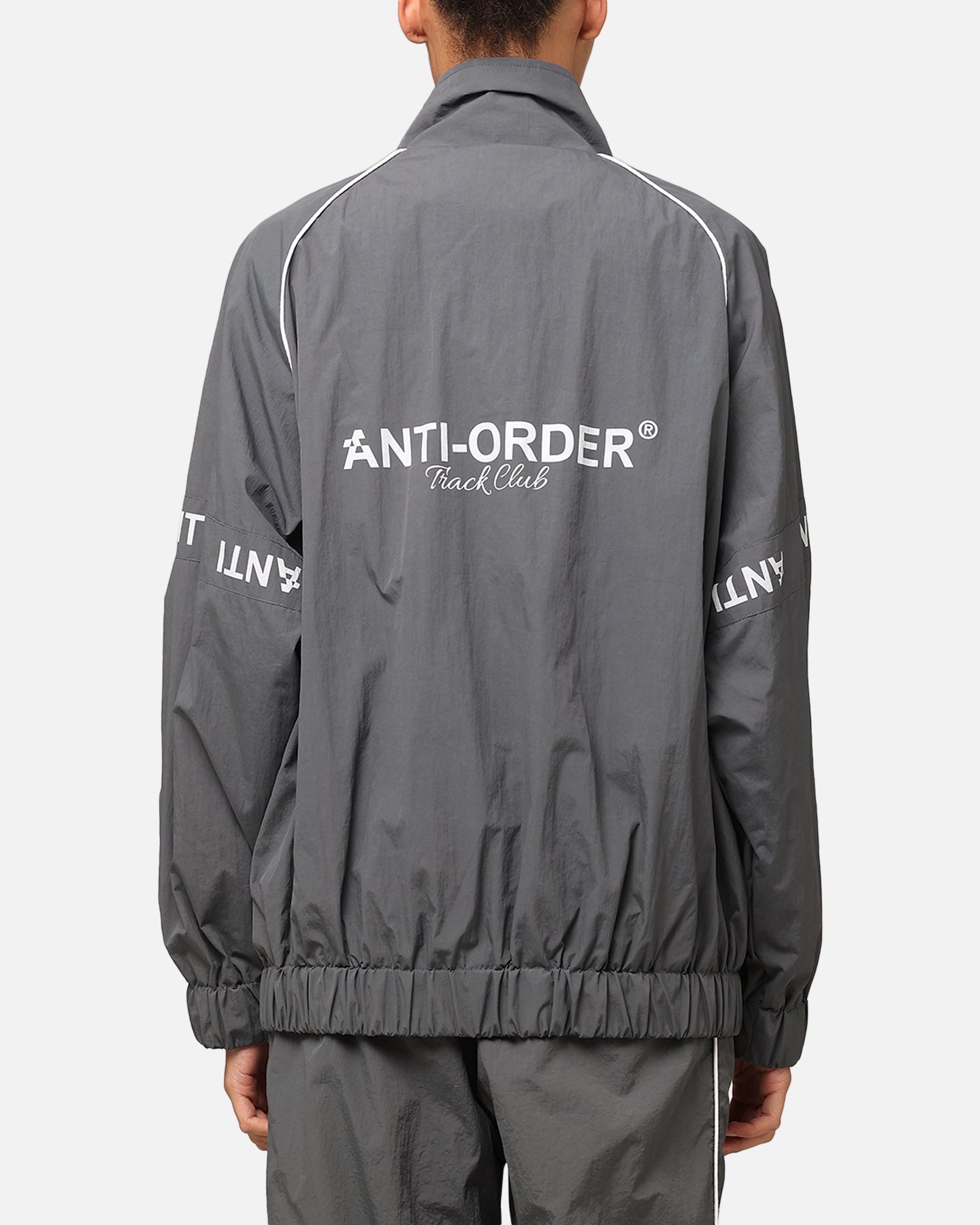 The Anti Order Track Club Windbreaker Jacket Dark Grey/Grey